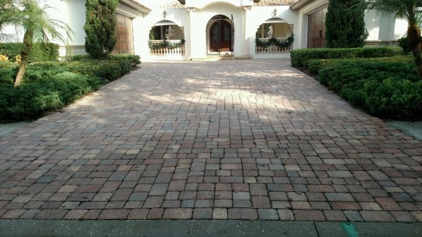 Walk- and Driveway before pressure washing and sealing the pavers