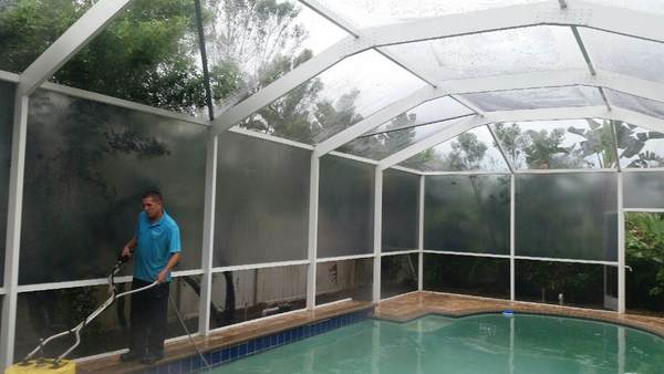 Pool Cage cleaning in progress in Trinity, Fl