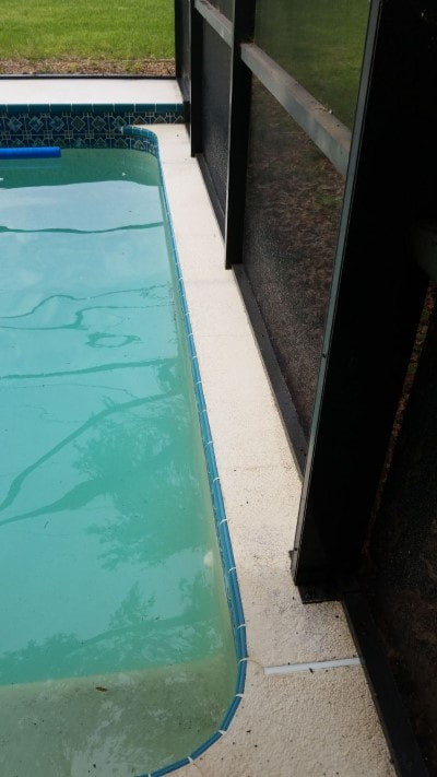pressure washing port richey pool patio side 2 after