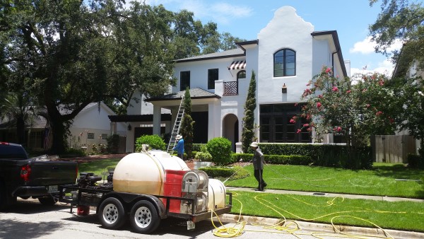 South Tampa home being pressure washed by DPI Pressure Washing + Window Cleaning