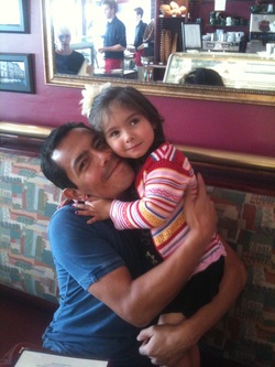 Mauricio Munoz of Pressure Washing Clearwater with daughter Ella baby