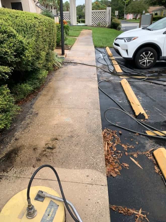 DPI commercial pressure washing sidewalk cleaning in progress