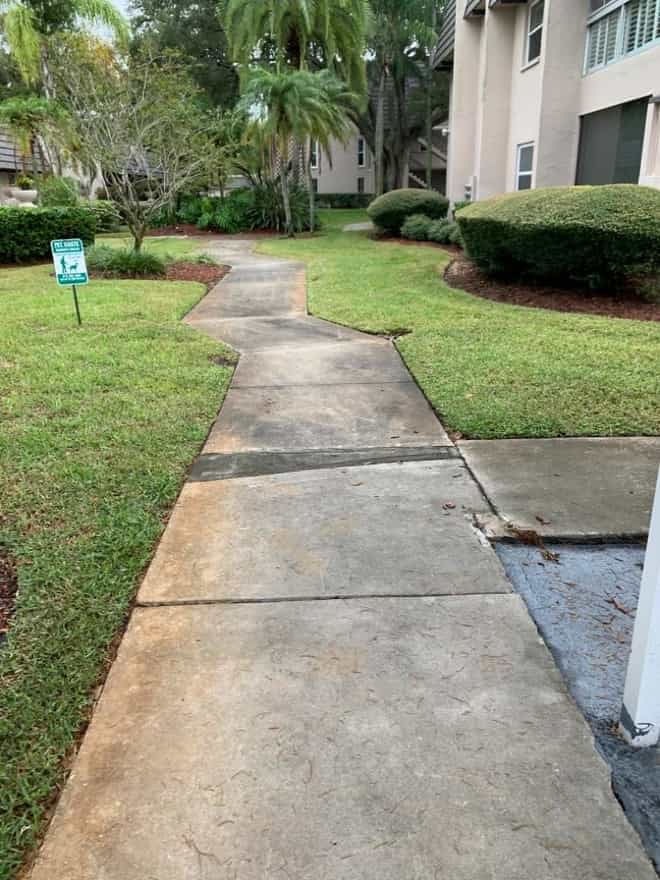 DPI commercial pressure washing sidewalk view before cleaning