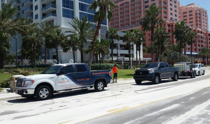 DPi team with two trucks at commercial job Clearwater Beach