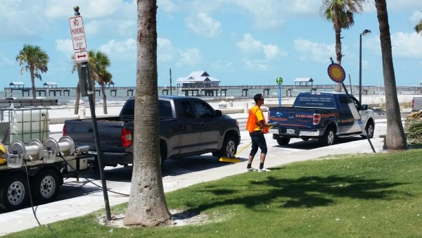 DPI Pressure washing staff cleans up in front of Wyndham Grand Hotel, Clearwater Beach