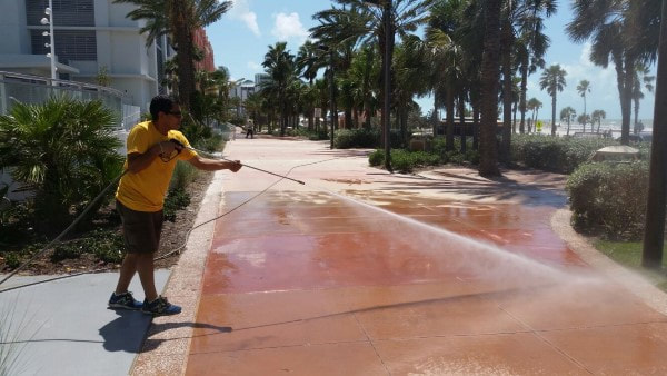 DPI Pressure washing owner cleans up in front of Wyndham Grand Hotel, Clearwater Beach