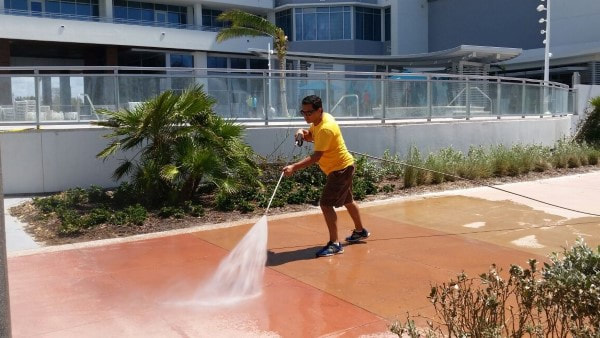 DPI Pressure washing owner cleans up in front of Wyndham Grand Hotel, Clearwater Beach