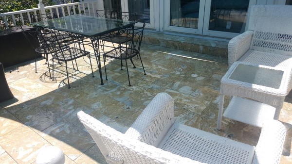 pressured washed patio with marble tiles